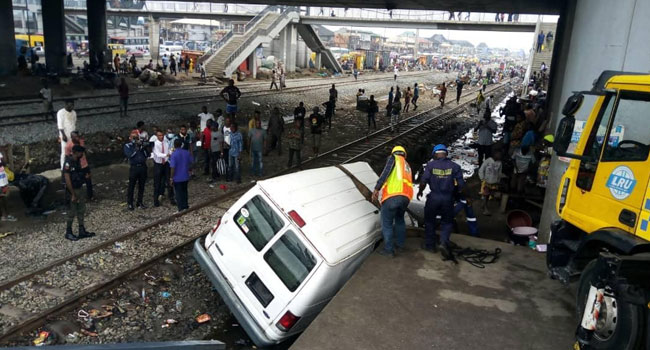 UPDATED: One killed as vehicles collide with train in Oshodi