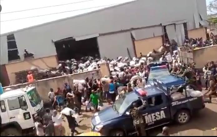 Lagos residents seize COVID-19 palliatives; govt condemns raid