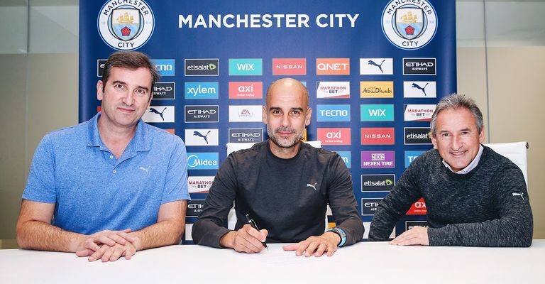 Guardiola signs new contract to stay at Manchester City until 2023