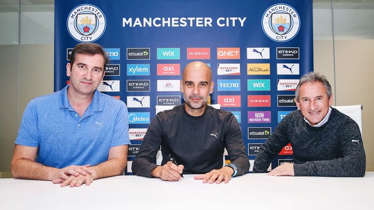 Guardiola signs new contract to stay at Manchester City until 2023