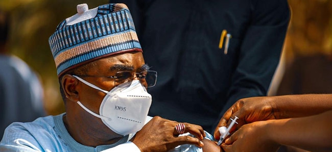 Buhari’s Chief of Staff, Garba Shehu, others take COVID-19 vaccination