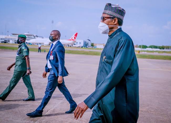BREAKING: Buhari returns from France
