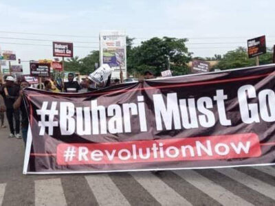 UPDATE: #BuhariMustGo protesters block Abuja Airport road