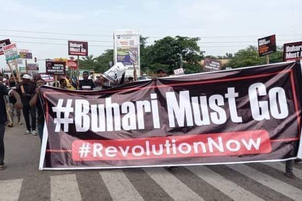 UPDATE: #BuhariMustGo protesters block Abuja Airport road