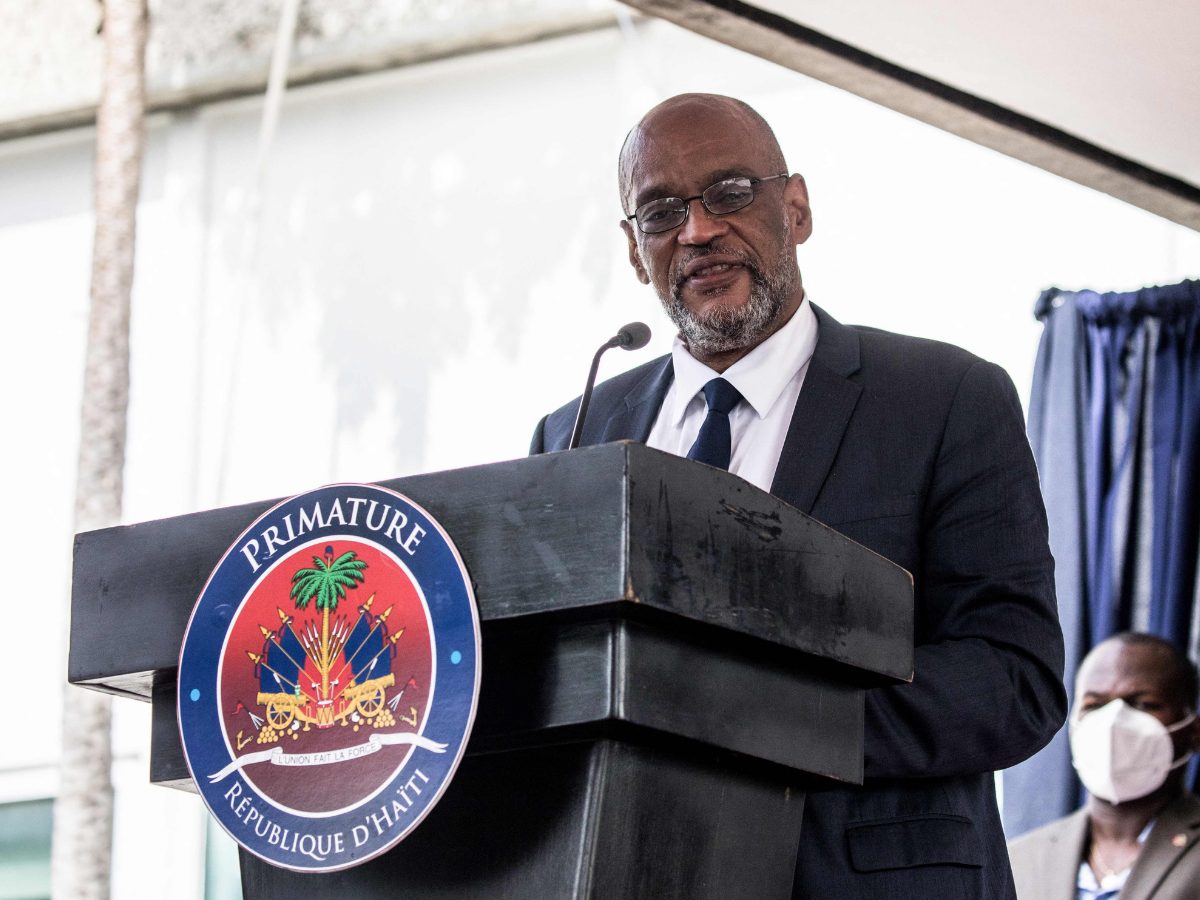 Roiled by presidential assassination, Haiti swears in new PM