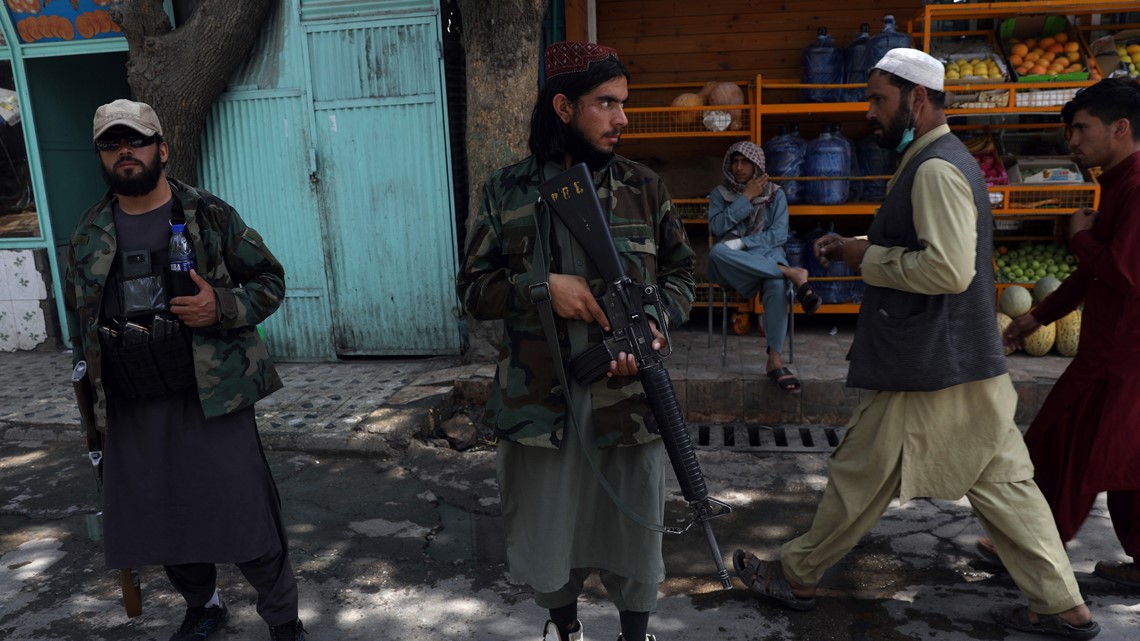 7 Afghans killed in chaos at Kabul airport; fighters seize areas from Taliban