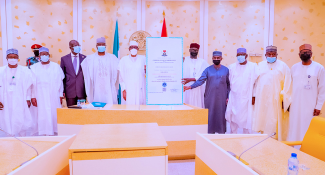 President Buhari receives Certificate of Incorporation for NNPC