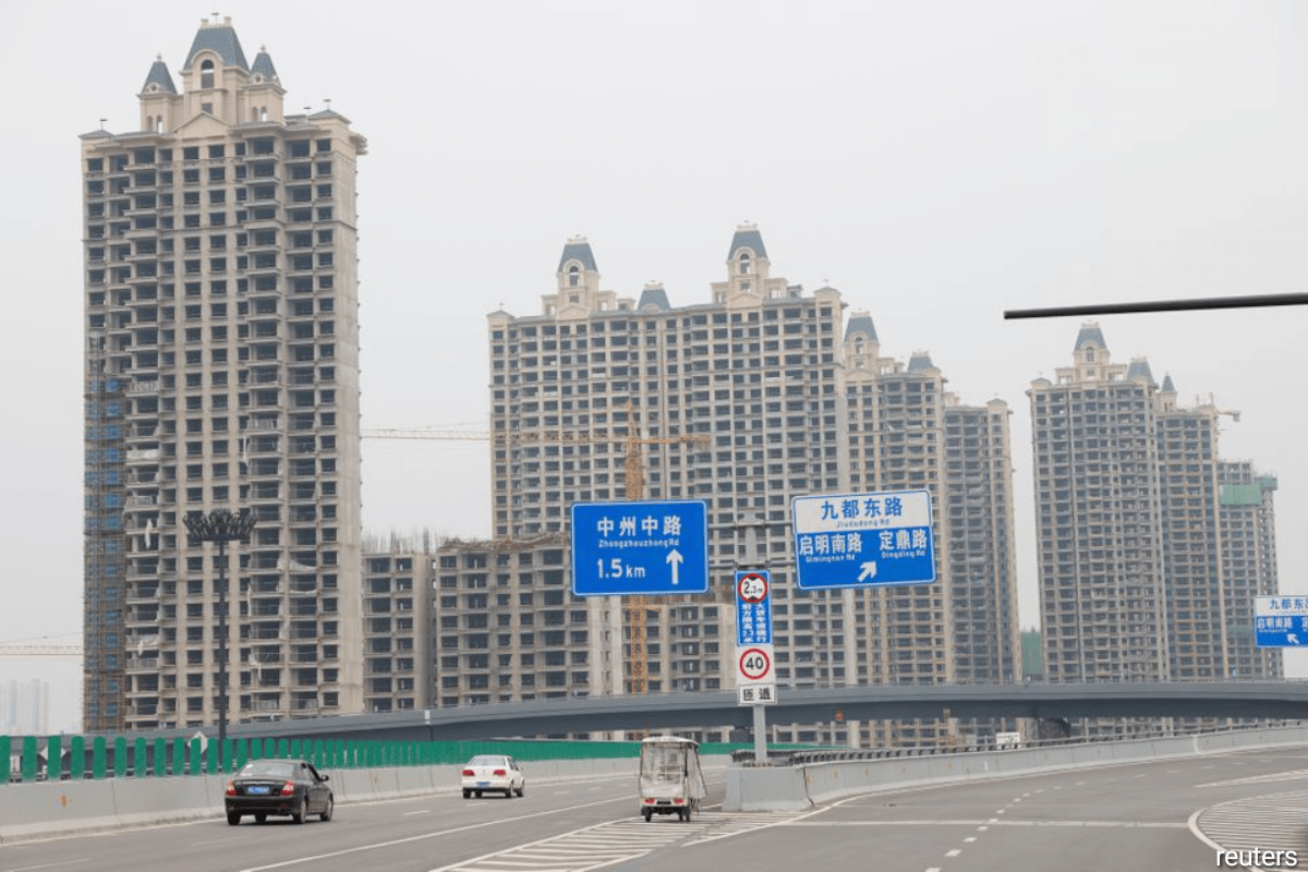 China's economy stumbles on power crunch, property woes