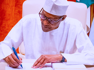 President Buhari signs Climate Change, AMCON Bills into law