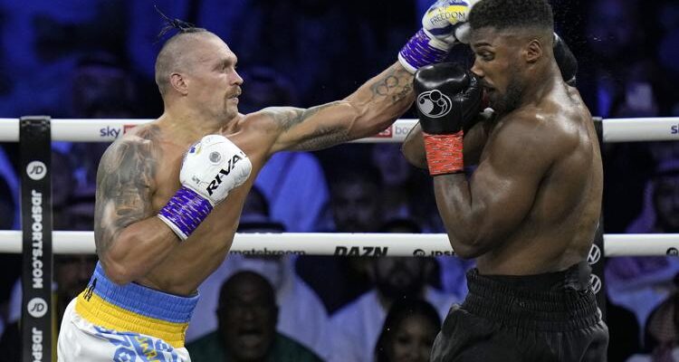 Usyk beats Joshua by split decision in heavyweight title fight