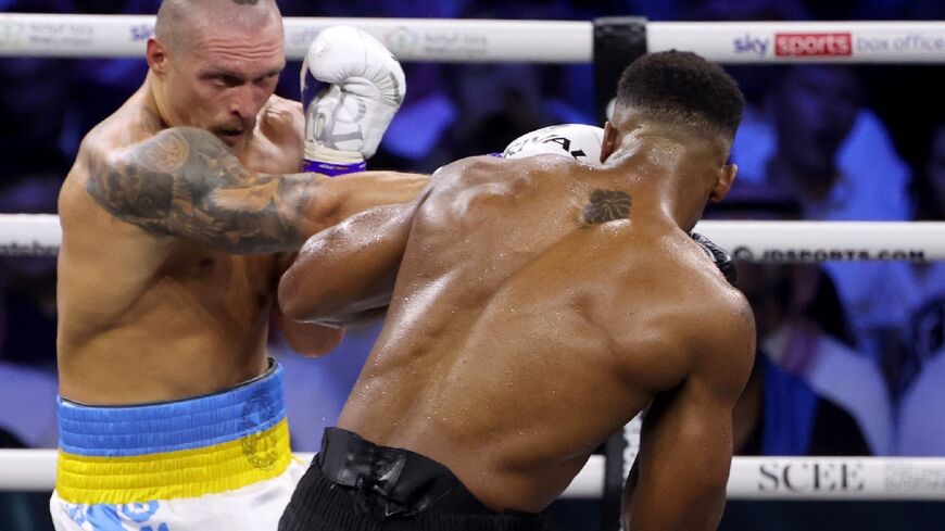 Usyk beats Joshua by split decision in heavyweight title fight