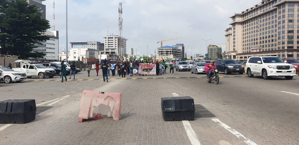 Nigerians Hold #EndSARSMemorial Procession At Lekki