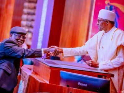 Buhari swears in Justice Ariwoola as CJN