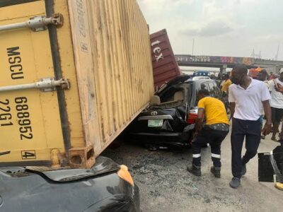 Driver killed as container falls on vehicles in Lagos