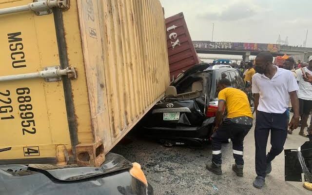 Driver killed as container falls on vehicles in Lagos