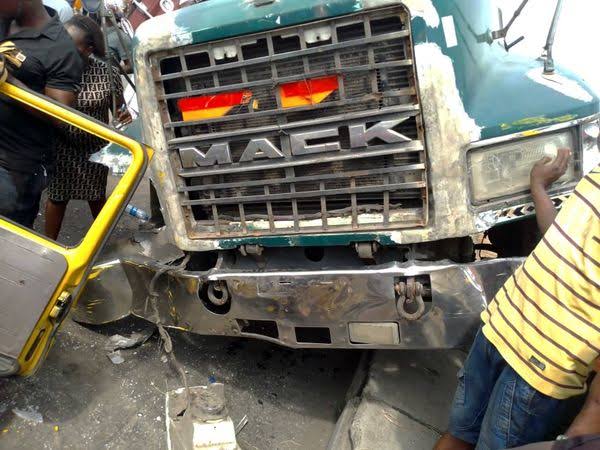 Driver killed as container falls on vehicles in Lagos