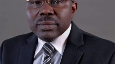 mr-muiz-banire-in-suit