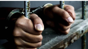 drug-trafficker-in-chains