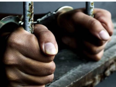 drug-trafficker-in-chains