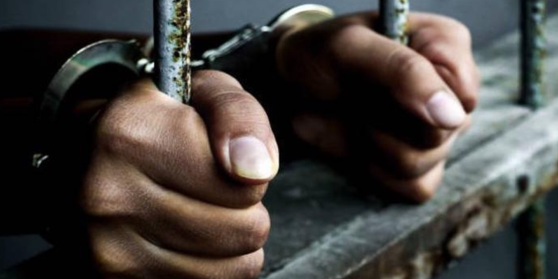 drug-trafficker-in-chains
