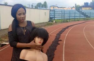Nigerian-Woman-Breaks-Guinness-World-Record-For-Longest-Handmade-Wig