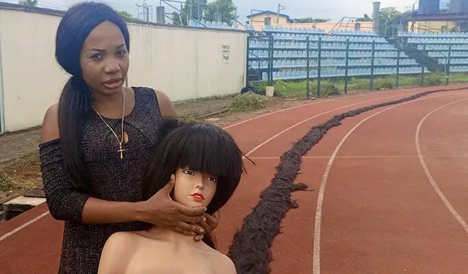 Nigerian-Woman-Breaks-Guinness-World-Record-For-Longest-Handmade-Wig